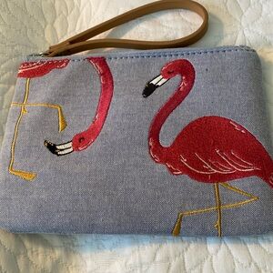 Flamingo purse with zipper closing. Lined in blue with card holders